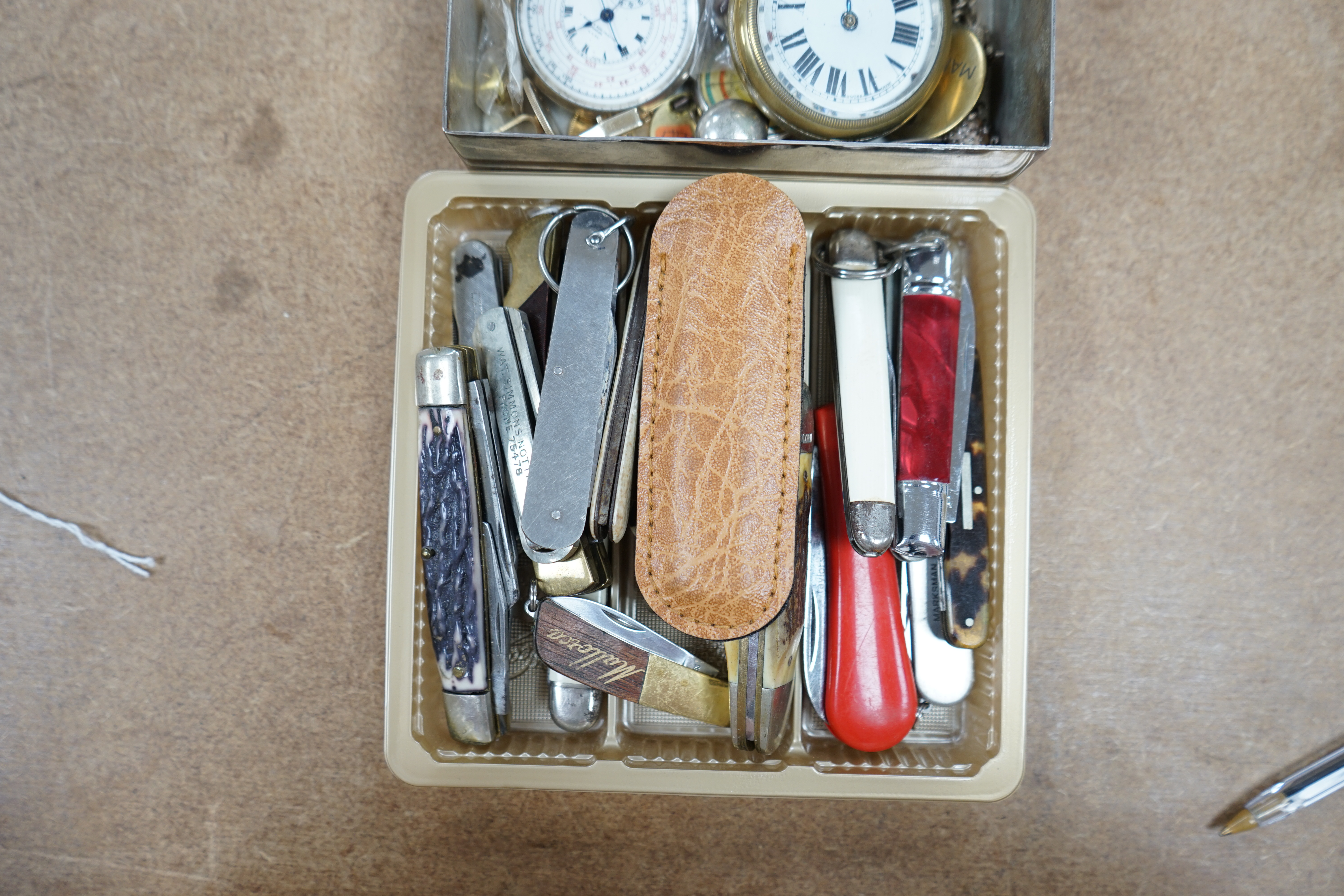 A collection of pen knives, a pocket watch stop watch and mixed collectables